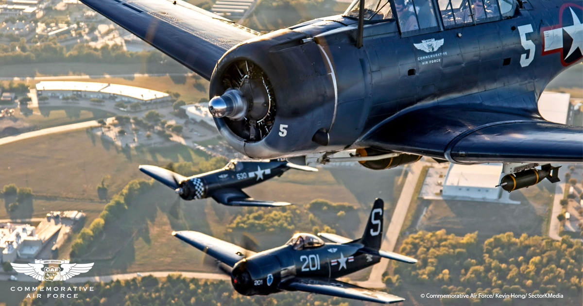 Airshow crowd and historic aircraft